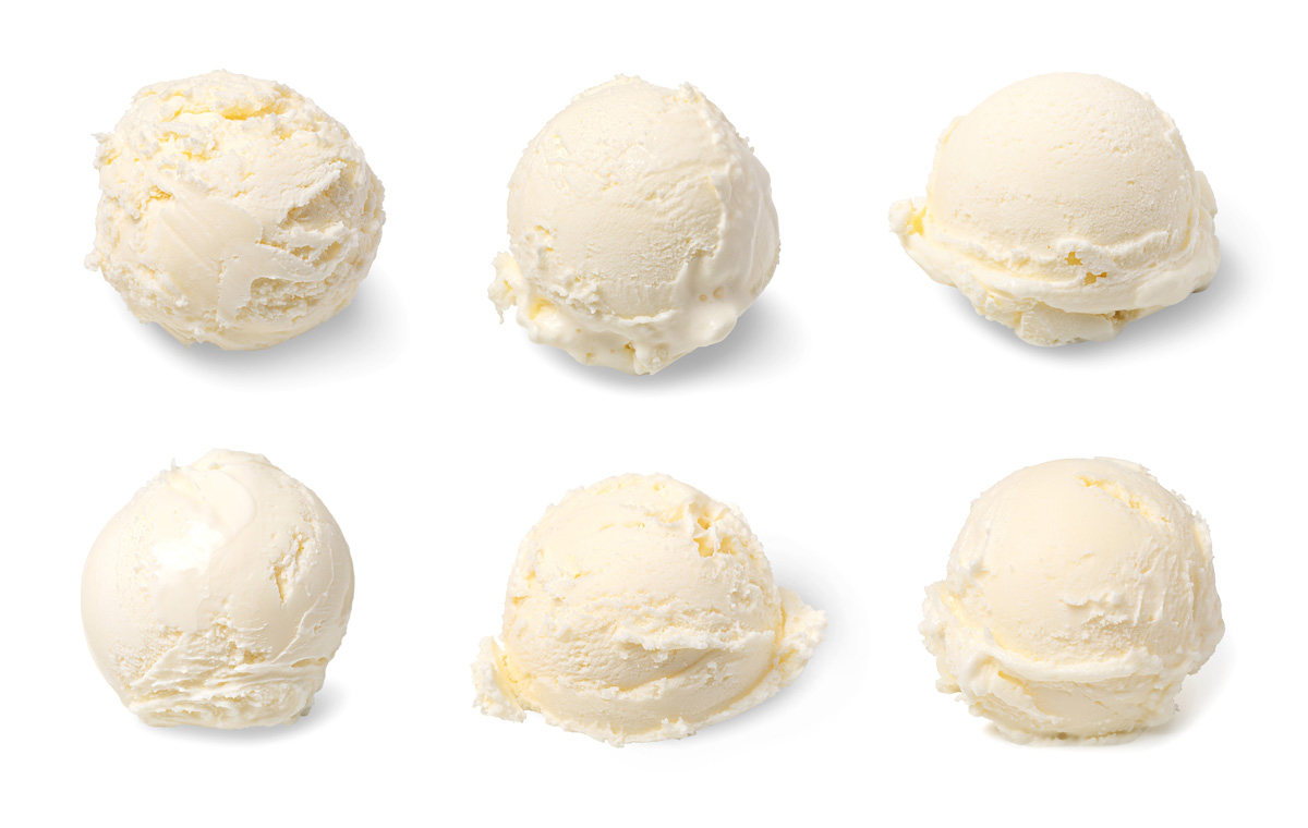 Six scoops of vanilla ice cream against a white background in Norman.